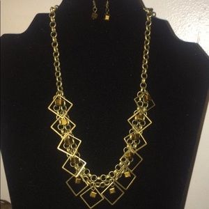 Gold cube earrings and necklace